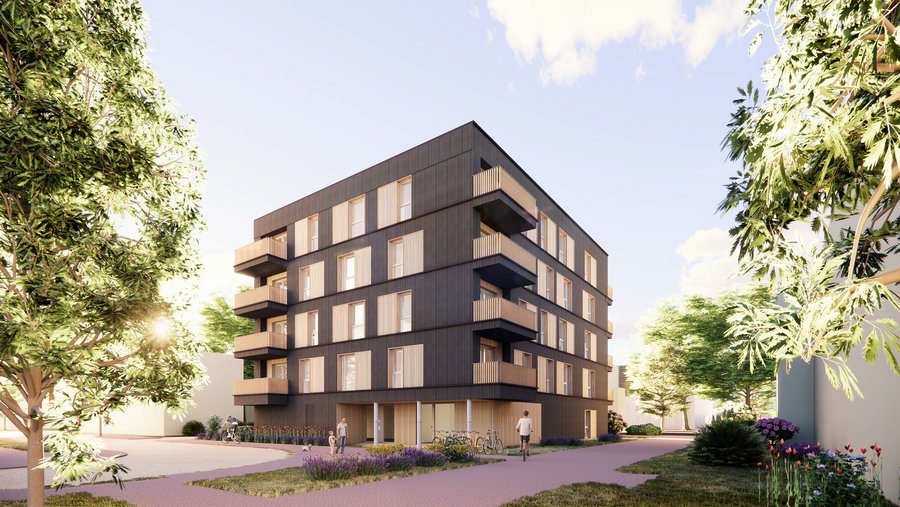 Modernes, mehrstöckiges Wohngebäude aus Holz und dunklen Fassadenelementen, umgeben von Bäumen, Wegen und bepflanzten Grünflächen.
