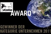 Utopia Award-Grafik mit der Darstellung des Planeten Erde und der Aufschrift "Gewinner der Kategorie Unternehmen 2011".".