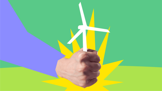 Hand hält ein stilisiertes Windrad auf grünem Hintergrund.