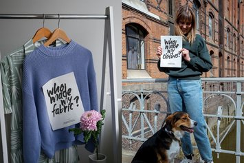 Links ein blauer Pullover auf einem Kleiderbügel mit dem Text: "Who made my fabric?" im Vordergrund, daneben eine Person mit Hund hält ein Schild mit "Who made my clothes?" in urbaner Umgebung.